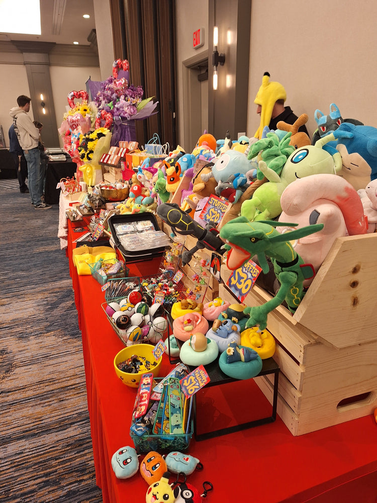 Display with stuffies, bouquets, sleepy bois, beanies, mini figures, and more!